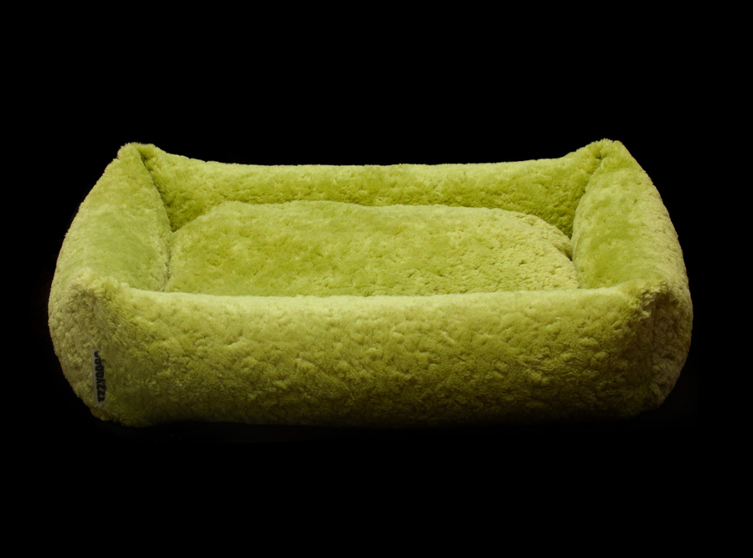 Izzydogg design dog bed with head rest in leaf green recycled fluffy faux fur with removable cover and high quality memory foam.