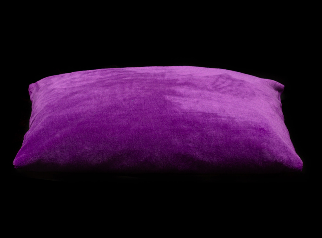 Izzydogg design dog bed cushion in dark purple recycled fluffy faux fur with removable cover and high quality memory foam.