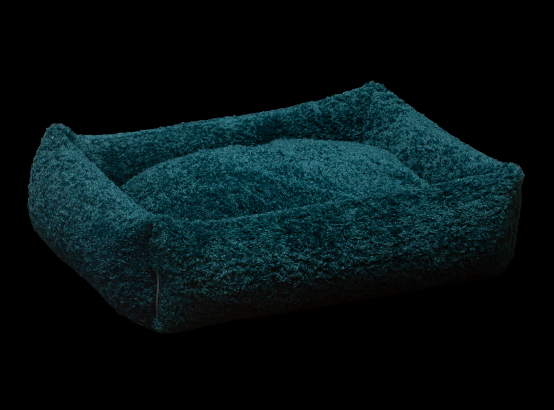 Izzydogg design dog bed with head rest in dark blue petrol recycled fluffy faux fur with removable cover and high quality memory foam.